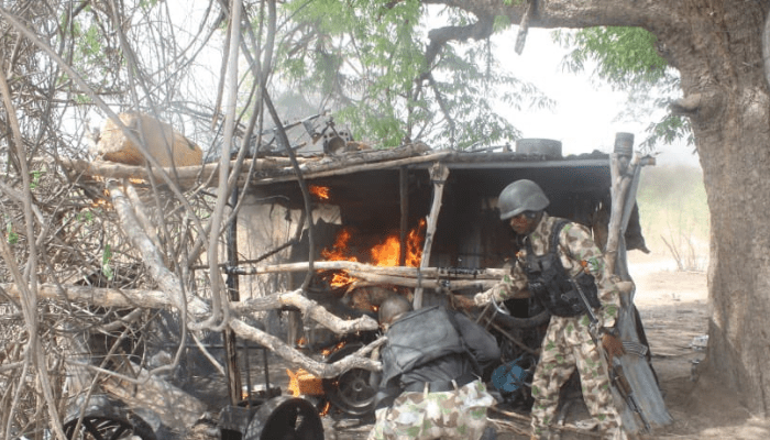 Troops burning terrorists camp
