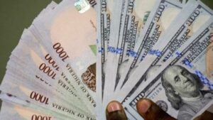 Naira gains against dollar, exchanges at N742